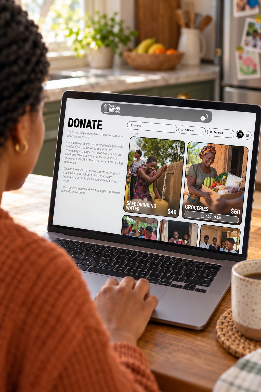 Illustrative image: Over-the-shoulder view of an adult browsing the Virtual Giving Machine donation page on a laptop.